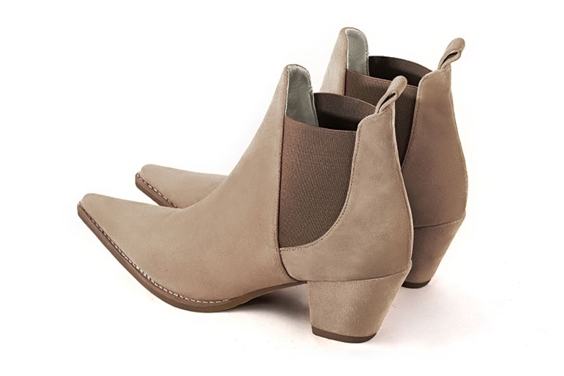 Tan beige and taupe brown women's ankle boots, with elastics. Pointed toe. Medium cone heels. Rear view - Florence KOOIJMAN